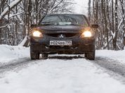 Быстро, шумно, накладно: тест-драйв 20-летнего Mitsubishi Lancer