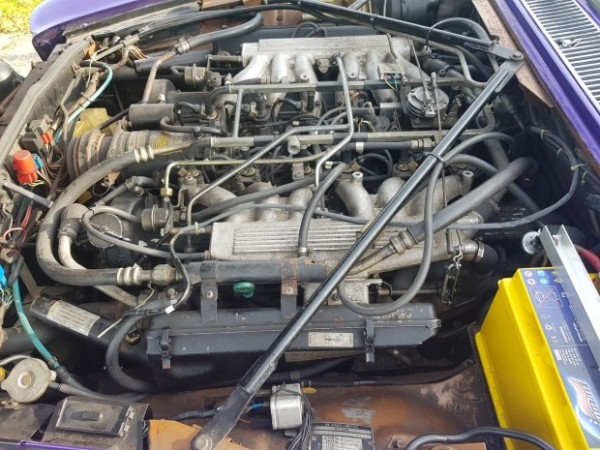 Старенький Jaguar XJ перетворили на незвичайний шестиколісний пікап